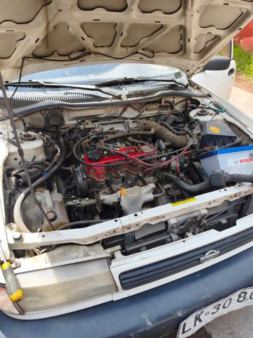 Nissan Sentra 1997 – motor con distribución puesta a punto – electromecánico a domicilio en Santiago